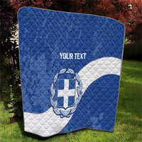 Blue and white quilt blanket with Greece crest and 'YOUR TEXT' centered