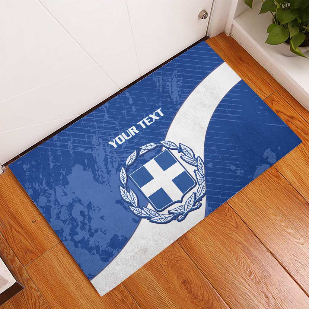 Blue Greece-themed rubber doormat with shield emblem, laurel border, and “YOUR TEXT”