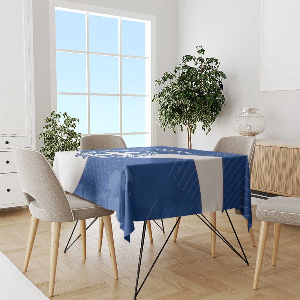 Blue football tablecloth draped over dining table