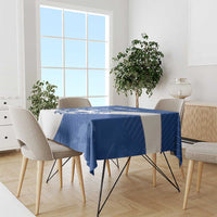 Blue football tablecloth draped over dining table