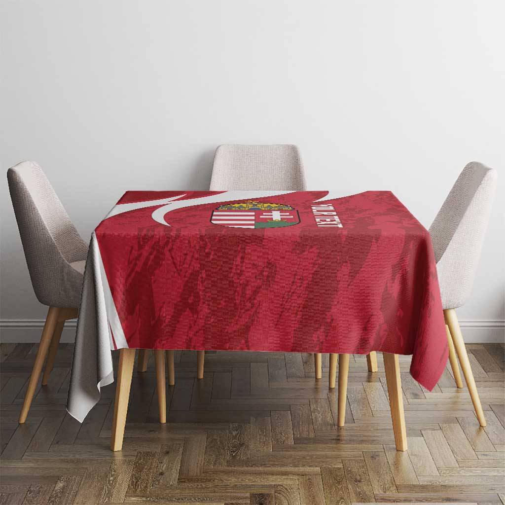 Red tablecloth with Hungary crest center and white curved flame-style graphics