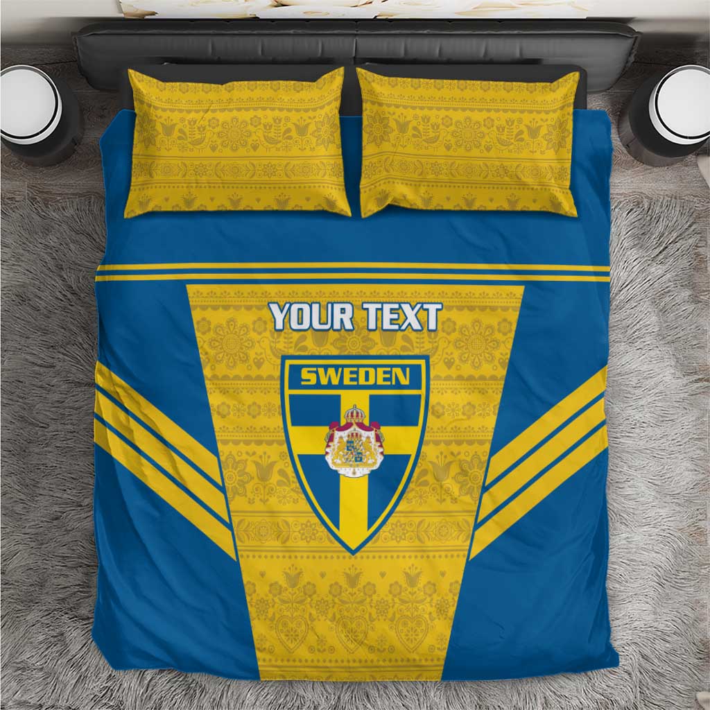 Blue-and-yellow football bedding set with Sweden crest and custom text, two pillows.