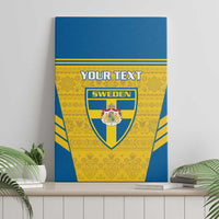 Blue and gold Sweden crest canvas wall art with customizable text, on a shelf