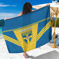Blue and yellow Sweden football sarong with custom text and crest, draped beach wrap