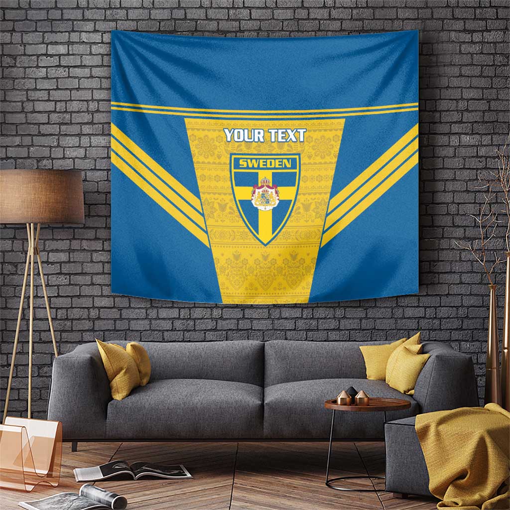 Blue tapestry hanging with yellow rays framing Sweden crest and YOUR TEXT