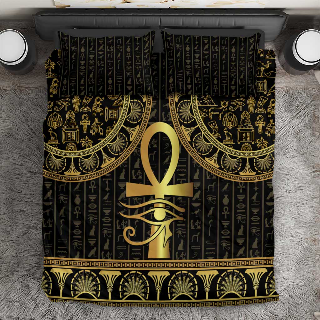 Black bedding duvet with gold Ankh and Eye of Horus center, hieroglyph panel design