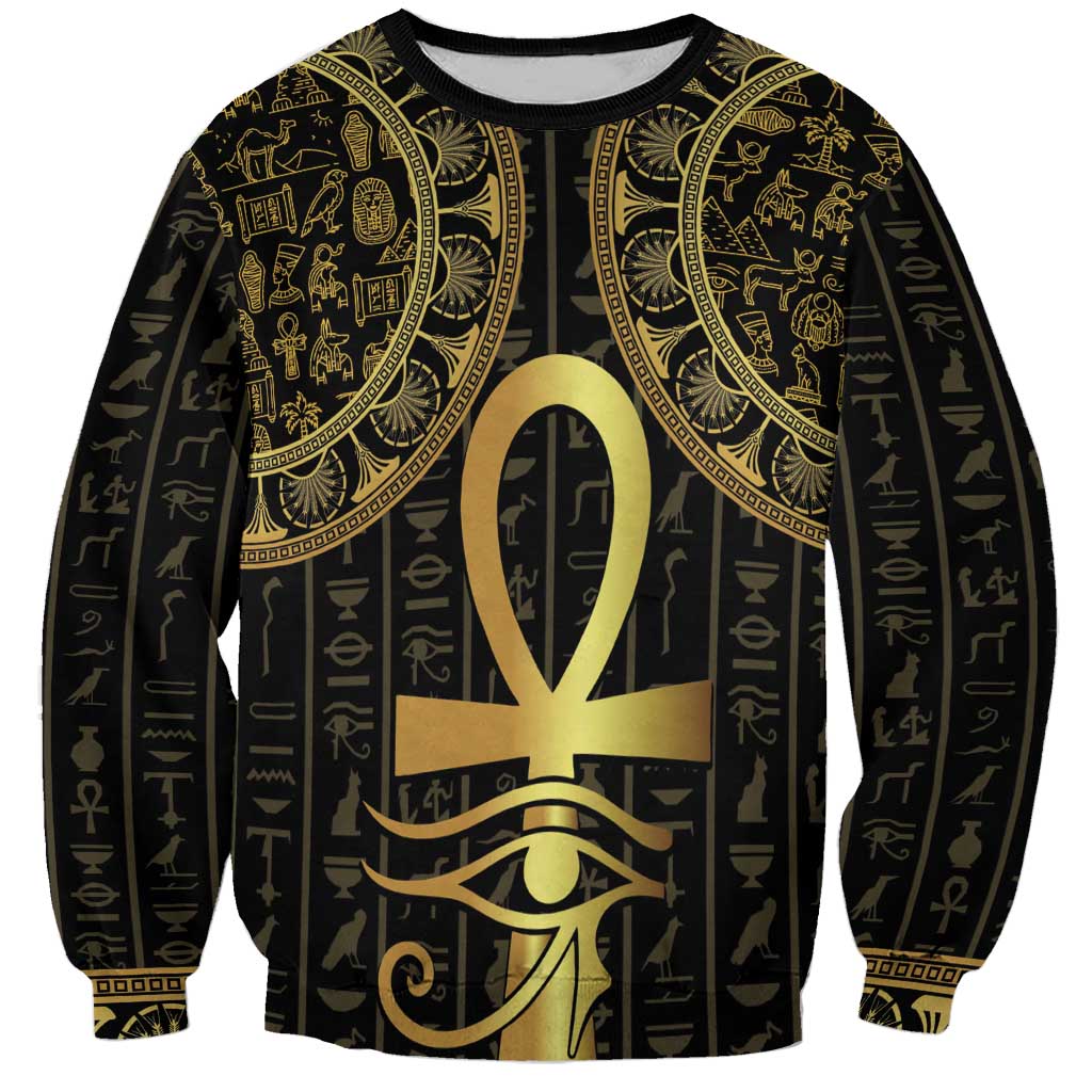 Unisex black crewneck sweatshirt with gold ankh and Eye of Horus hieroglyph graphics