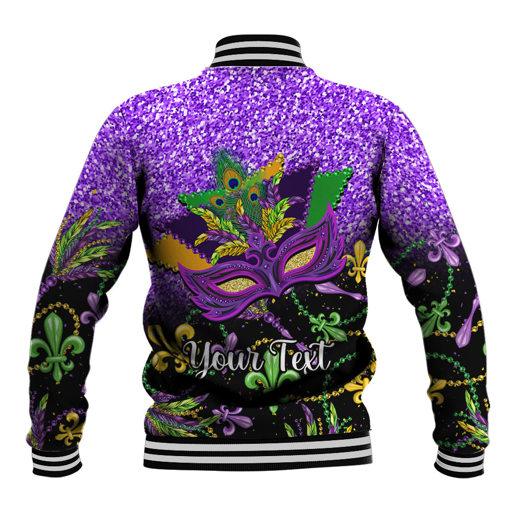 Purple glitter baseball jacket with Mardi Gras mask back graphic, striped rib cuffs