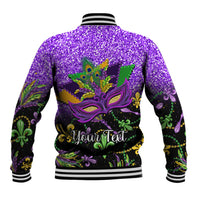 Purple glitter baseball jacket with Mardi Gras mask back graphic, striped rib cuffs