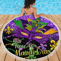 Round purple beach blanket with carnival mask artwork and "It's Time for Mardi Gras"