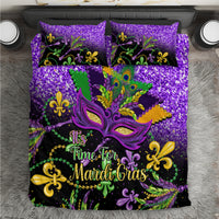 Purple Mardi Gras bedding set with sequined effect, masquerade mask and "It’s Time for Mardi Gras" text