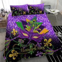 Purple Mardi Gras bedding set featuring colorful masquerade mask, peacock feathers, and "It’s Time for Mardi Gras"