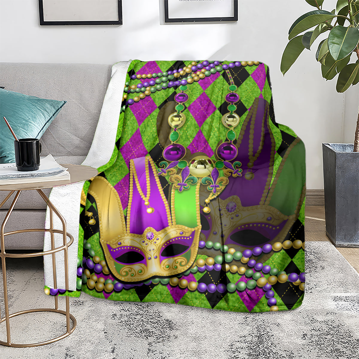 Green and purple jester mask throw blanket with diamond pattern and dangling earring beads