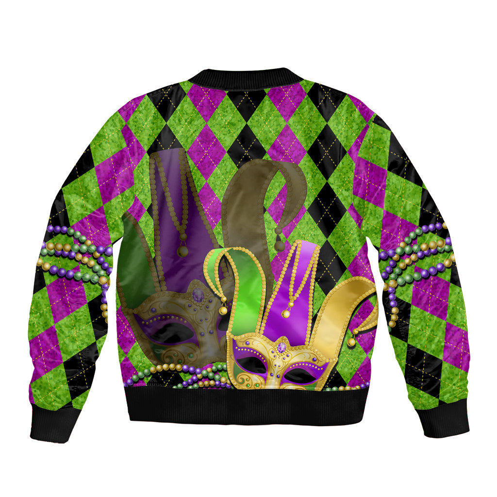 Unisex green bomber jacket with Mardi Gras jester mask graphic, purple and black