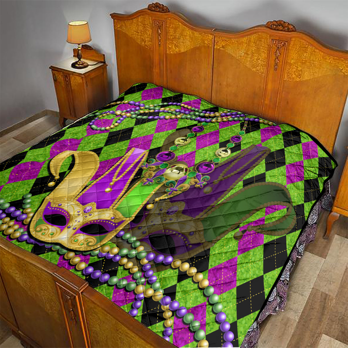 Mardi Gras jester mask quilt on bedspread with purple-green diamonds and hanging bead details