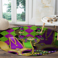 Round jester mask carpet with green and purple diamonds, gold fleur-de-lis and bead strings