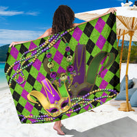 Colorful green and purple jester sarong with gold jester mask and bead trim