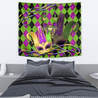 Jester mask tapestry featuring purple center figure, gold mask, and purple and green bead garland