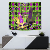 Colorful jester mask tapestry with gold mask, purple accents, and green argyle border beads