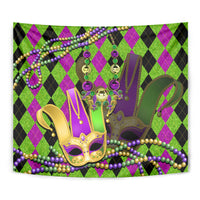 Corner-wrapped jester mask tapestry in purple, green, and gold with bead garlands and tassels