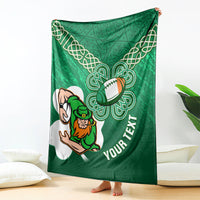 Green rugby blanket draped with celtic shamrock knots, leprechaun rugby mascot, YOUR TEXT