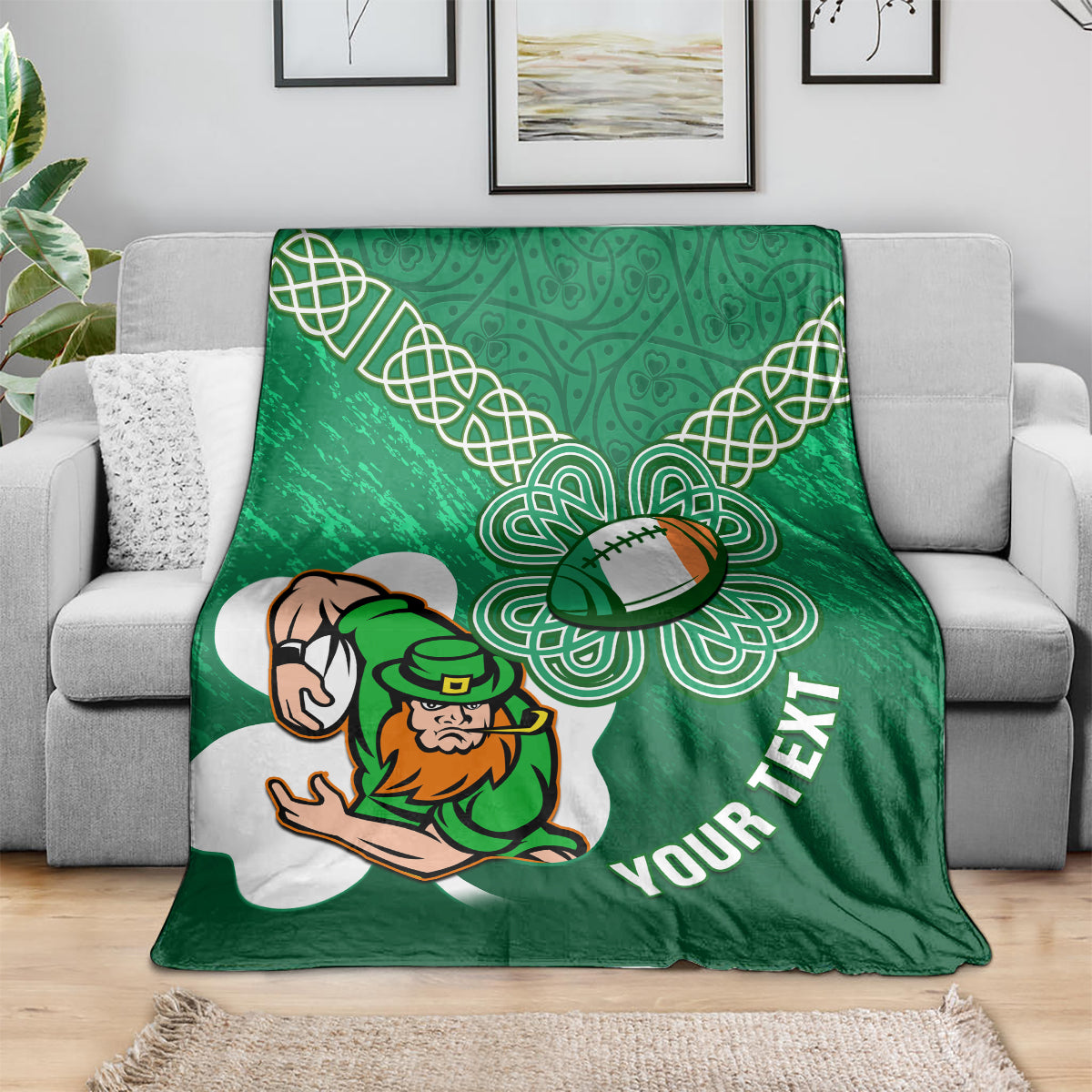 Green rugby blanket on couch with celtic shamrock knot art, leprechaun mascot, YOUR TEXT