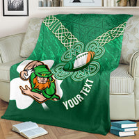 Green rugby blanket on loveseat with celtic shamrock knots and leprechaun rugby mascot, YOUR TEXT