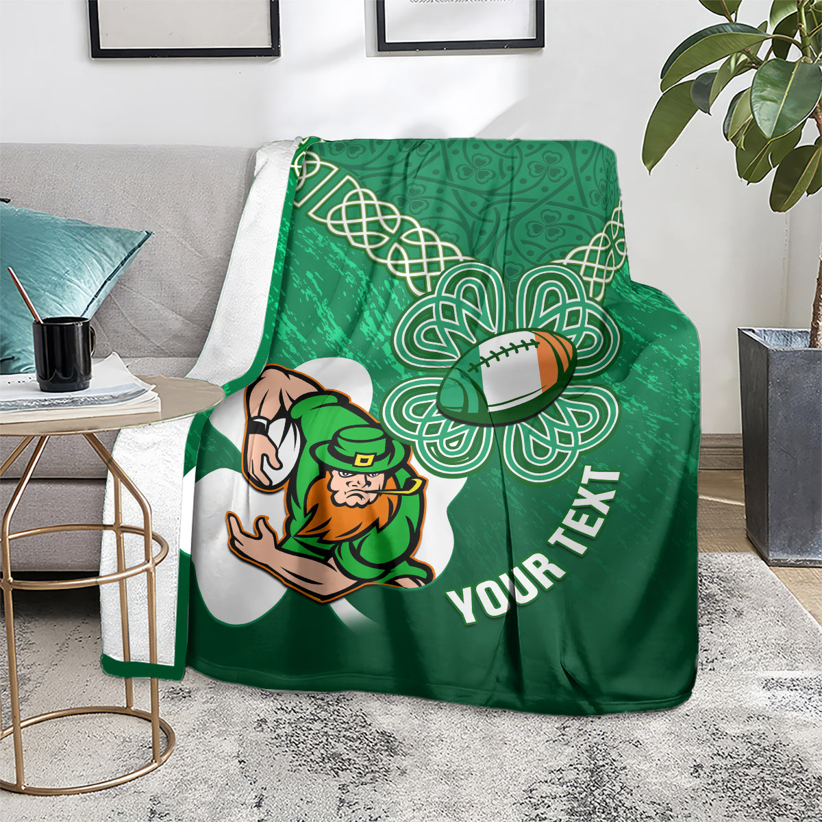 Green rugby blanket on sofa with celtic shamrock knots, leprechaun mascot, YOUR TEXT