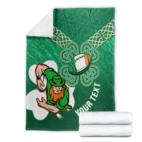 Folded green rugby blanket with celtic shamrock knots, leprechaun mascot, YOUR TEXT