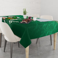 Green rugby tablecloth with Celtic knot pattern, shamrock accents, and centered rugby mascot.
