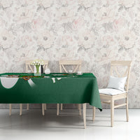 Green rugby tablecloth with Celtic knot shamrock pattern, shown on dining table centerpiece.