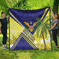 Quilt in blue, yellow, and white with eagle and palm tree design plus “United States” text.