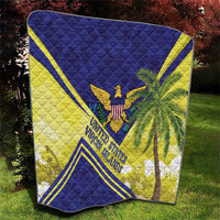 Quilt with quilted diamond texture in blue, yellow, and white; eagle, palms, and “Virgin Islands”.