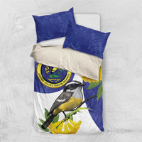 Blue and white duvet bedding set with yellow flowers, bird illustration, and seal logo