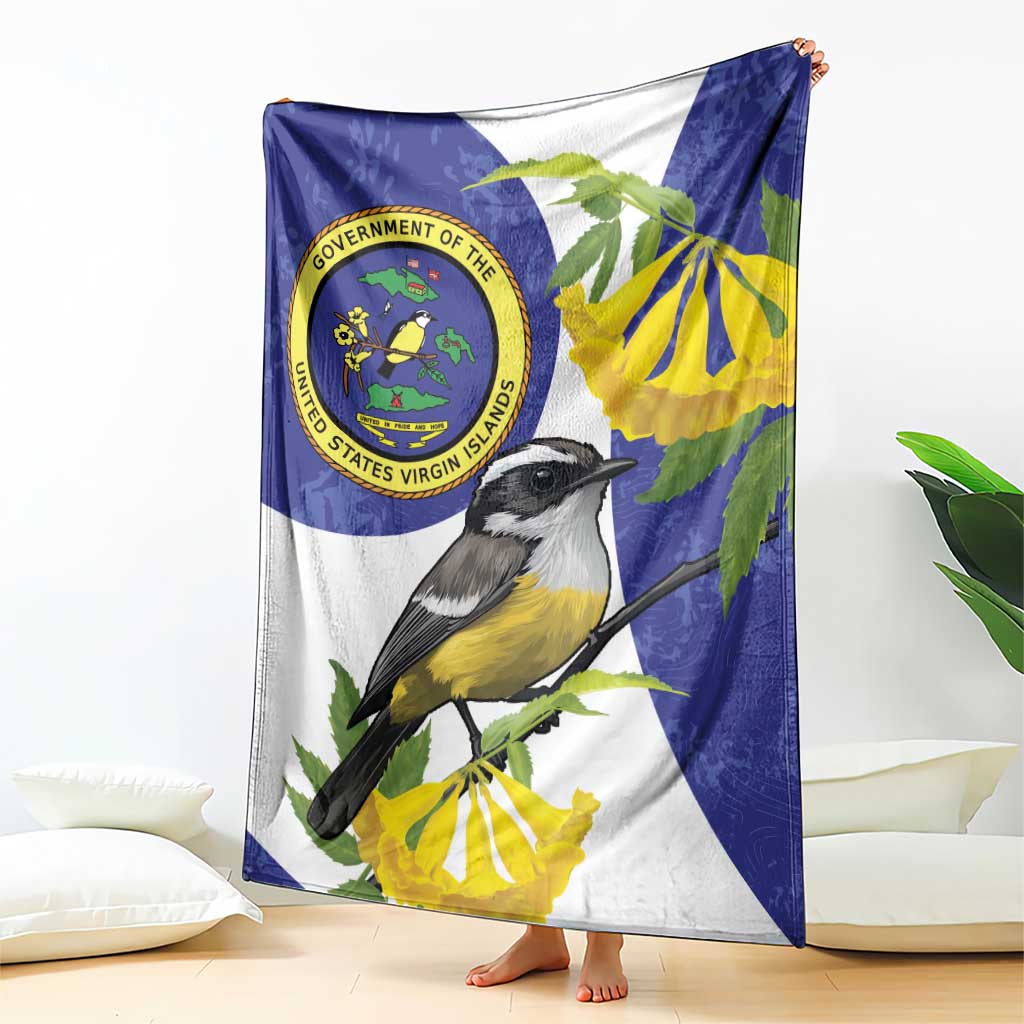 Blue and white bird print blanket with Virgin Islands seal and yellow blossoms