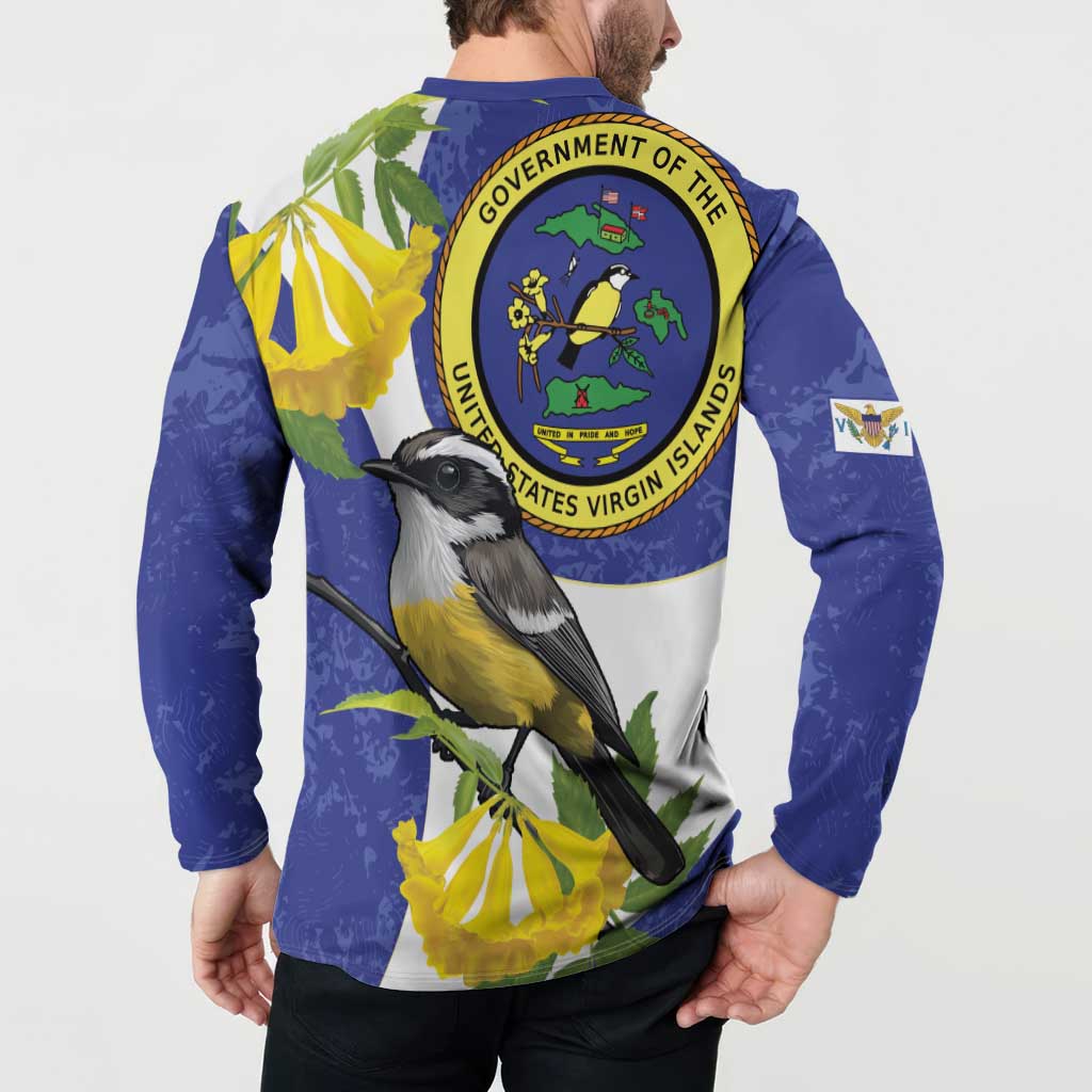 Blue button-front sweatshirt worn by model, back seal emblem and bird amid yellow flowers