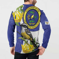Blue button-front sweatshirt worn by model, back seal emblem and bird amid yellow flowers