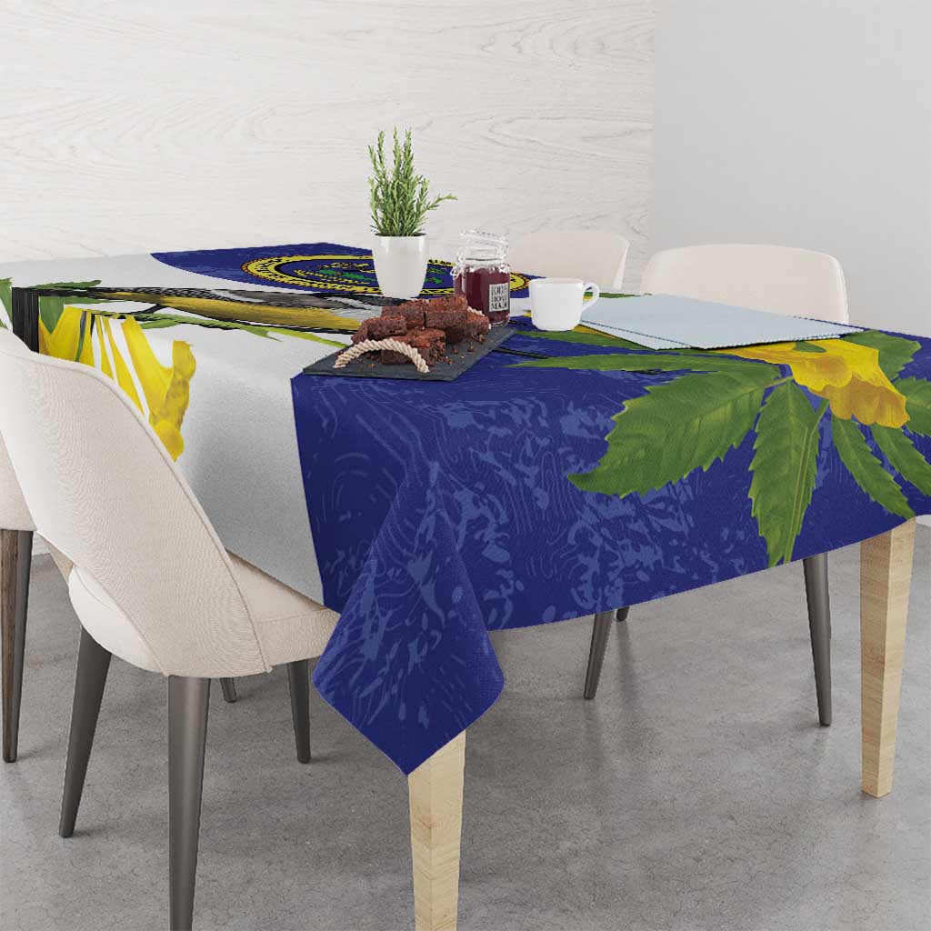 Blue and white tablecloth corner with large tropical flower and bird design
