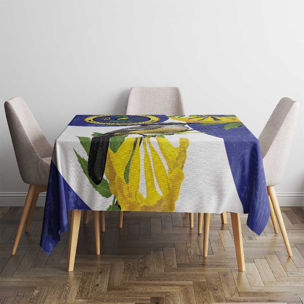 Rectangular blue and white tablecloth with bird, leaves, and flower print