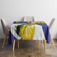 Rectangular blue and white tablecloth with bird, leaves, and flower print