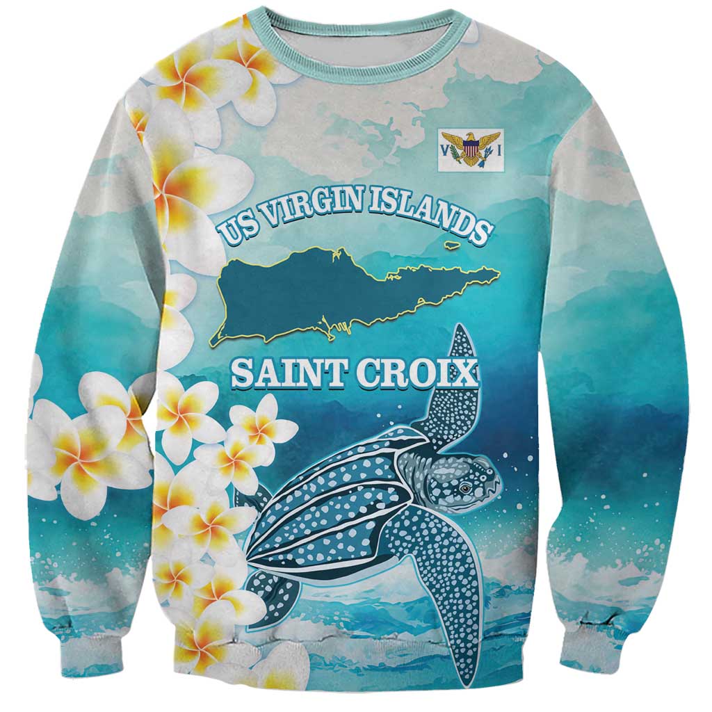Turquoise crewneck sweatshirt with whale graphic, map text, and plumeria flowers