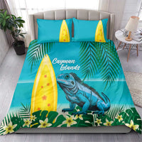Turquoise bedding set on bed: blue iguana, palm leaves, yellow surfboard pillows