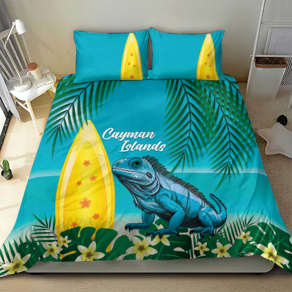 Turquoise bedding set with iguana artwork, palm fronds, and two yellow surfboard pillows