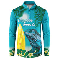 Turquoise button sweatshirt with iguana graphic, palm leaves, and tropical flowers
