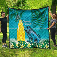 Turquoise quilt blanket featuring Cayman Islands text, yellow sail, and blue iguana