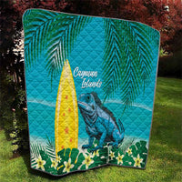 Turquoise Cayman Islands quilt blanket with iguana and tropical leaf motif, quilted texture