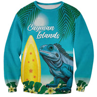 Turquoise crewneck sweatshirt with front tropical iguana, palm and surfboard graphic