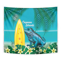 Turquoise tropical tapestry close-up: palm leaves, yellow surfboard, blue iguana, Cayman Islands