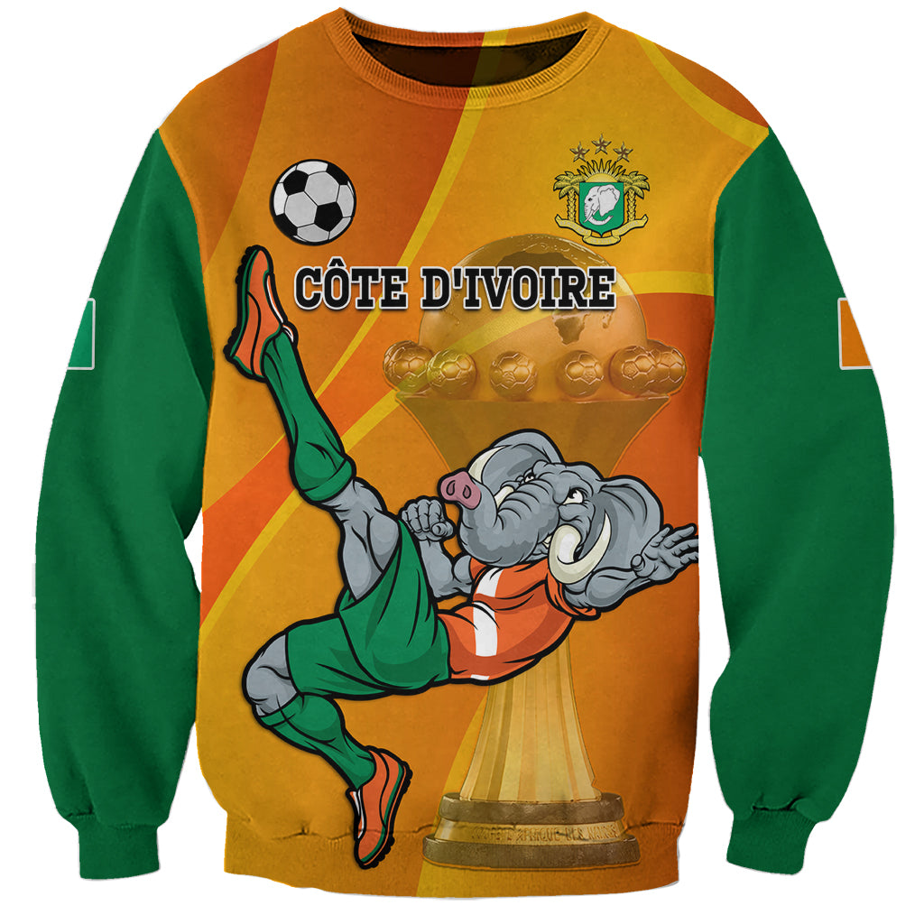 Orange and green football sweatshirt with mascot holding trophy and soccer ball graphic
