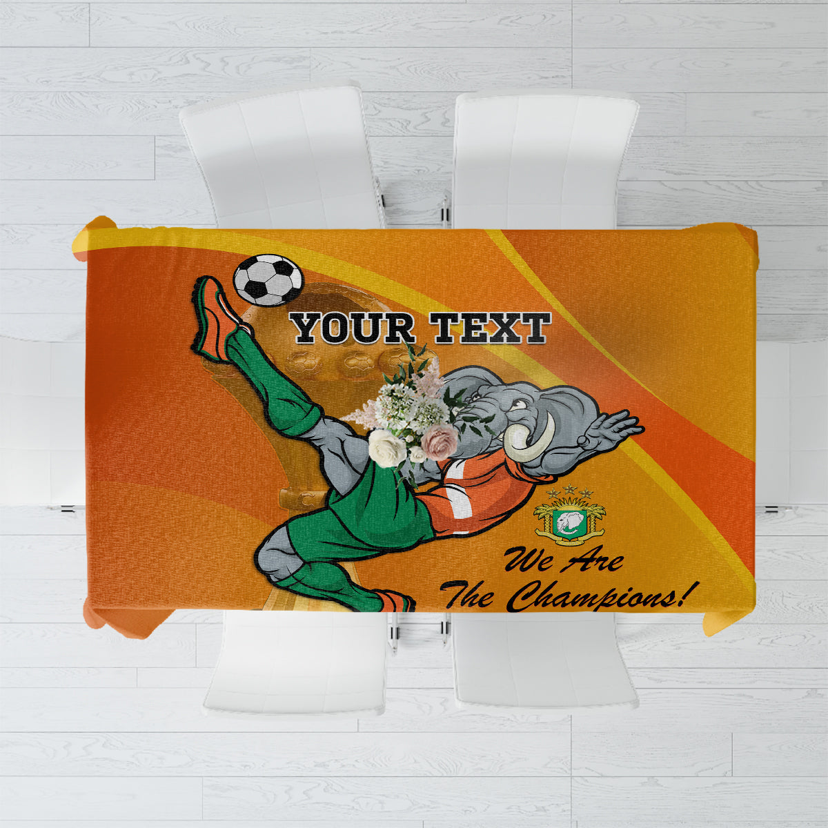 Orange football-themed tablecloth with mascot and trophy graphic, custom text panel
